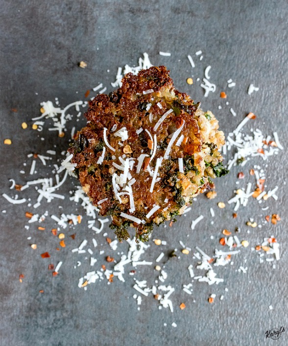 overhead shot of Kale & Quinoa Patties with parmesan and red pepper flakes garnished