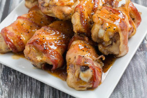 Bacon Wrapped Chicken Wings by Dishing Delish