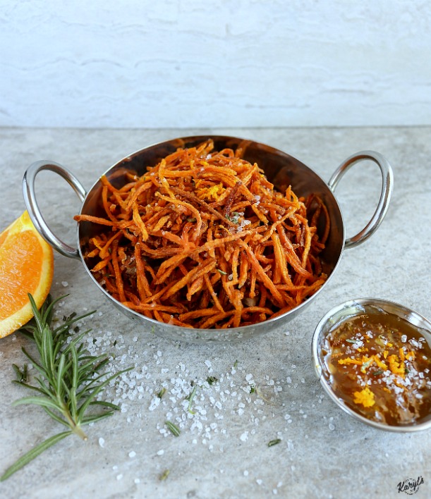 Matchstick Carrot Fries might be vegetables, but they sure taste like candy! These are a great way to get your kids to eat their veggies. Rosemary sea salt adds a distinctive bite and flavor that can't be beat #carrots #carrotfries #friedveggies #vegetables #vegan #glutenfree #sides #karylskulinarykrusade