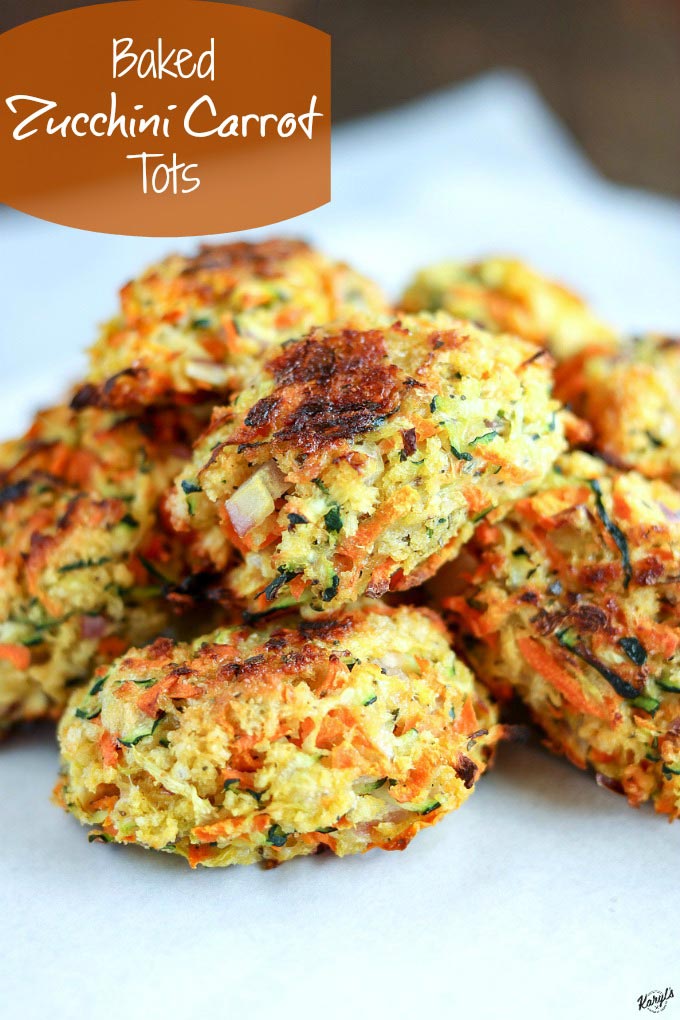 Baked Zucchini Carrot Tots stacked on parchment paper