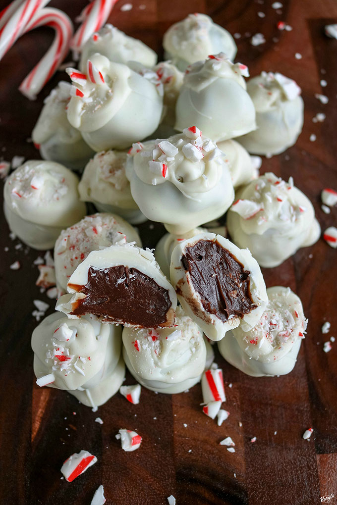 Chocolate Peppermint Truffle Bites will be your new favorite holiday treat. Use high quality chocolate, and finish with crushed candy canes for these rich, smooth and creamy bites of yum! #chocolate #meltedchocolate #dessert #bitesized #truffles #candycanes #karylskulinarykrusade