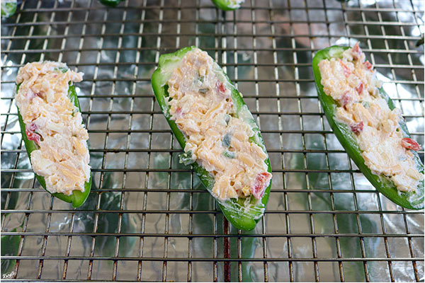 process shot: close up shot of jalapeno halves filled with pimiento cheese